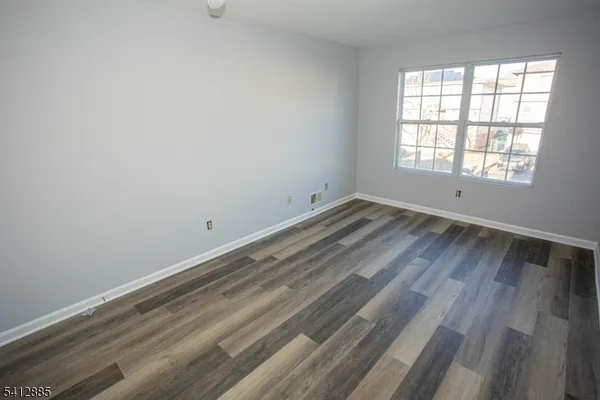 wooden floor and window in a room