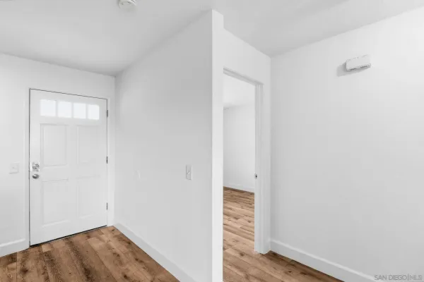 a view of small space with wooden floor