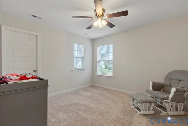 a workspace with furniture and window