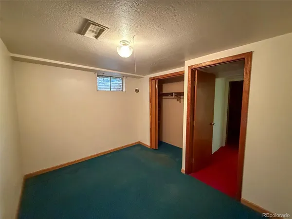 an empty room with closet