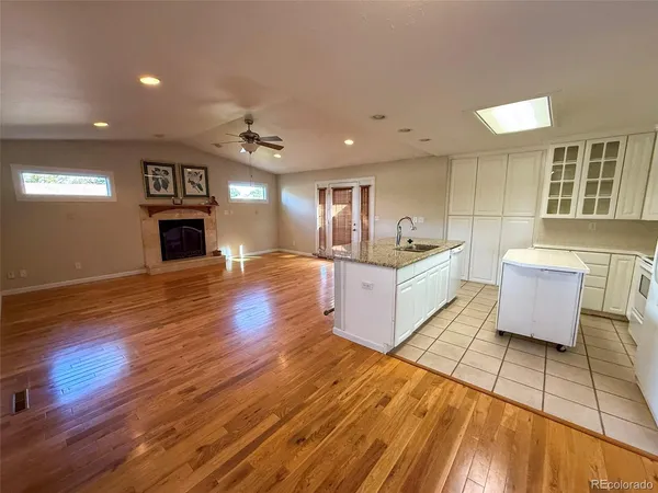 a large hall with lots of counter space and windows