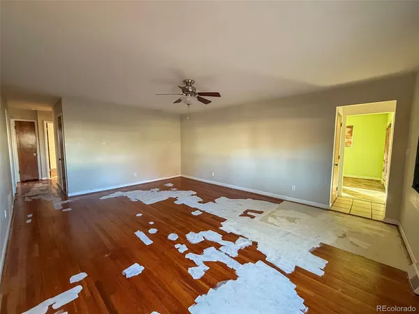 a view of a bedroom with a bed