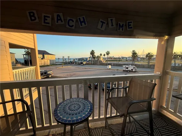 a view of a balcony dining area