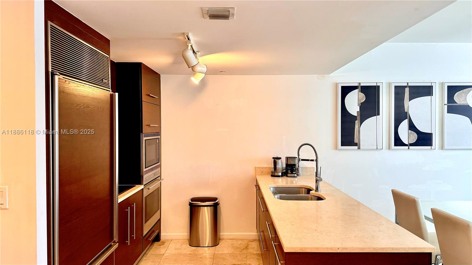 475 Brickell Avenue, Unit 2512 Miami, FL 33131 - Photo 30 of 59 a bathroom with a sink and a mirror