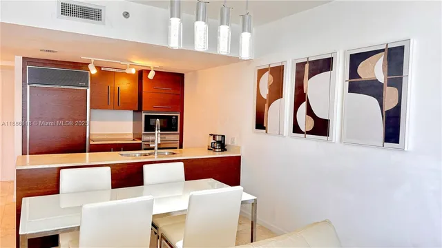 a large bedroom with a bed and a couch