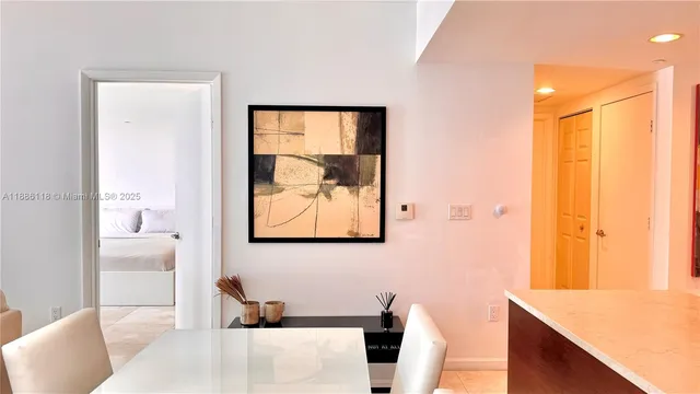 a bathroom with a double vanity sink mirror and shower