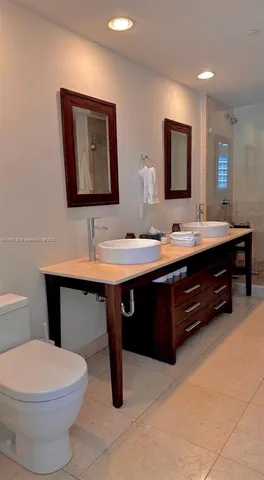 a view of a swimming pool with a lounge chairs