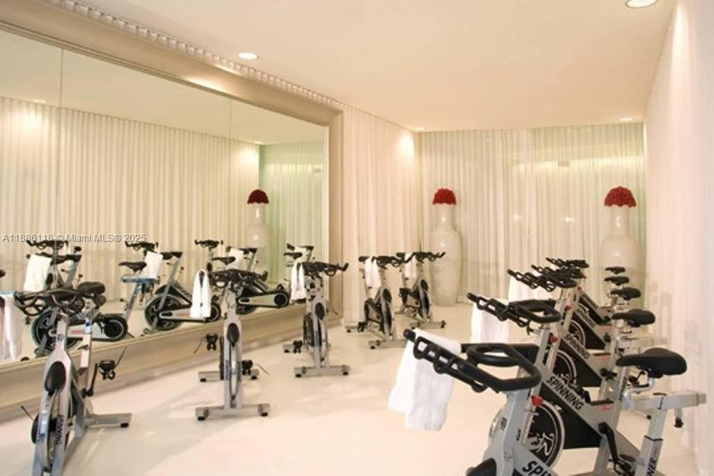 475 Brickell Avenue, Unit 2512 Miami, FL 33131 - Photo 56 of 59 a view of a room with gym equipment