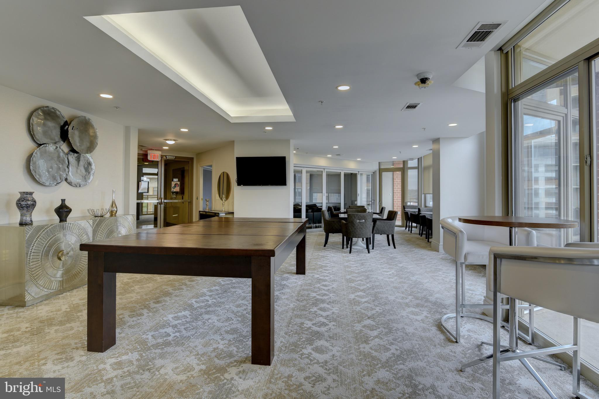 3600 South Glebe Road, Unit 414W Arlington, VA 22202 - Photo 24 of 28 a large kitchen with a table and chairs