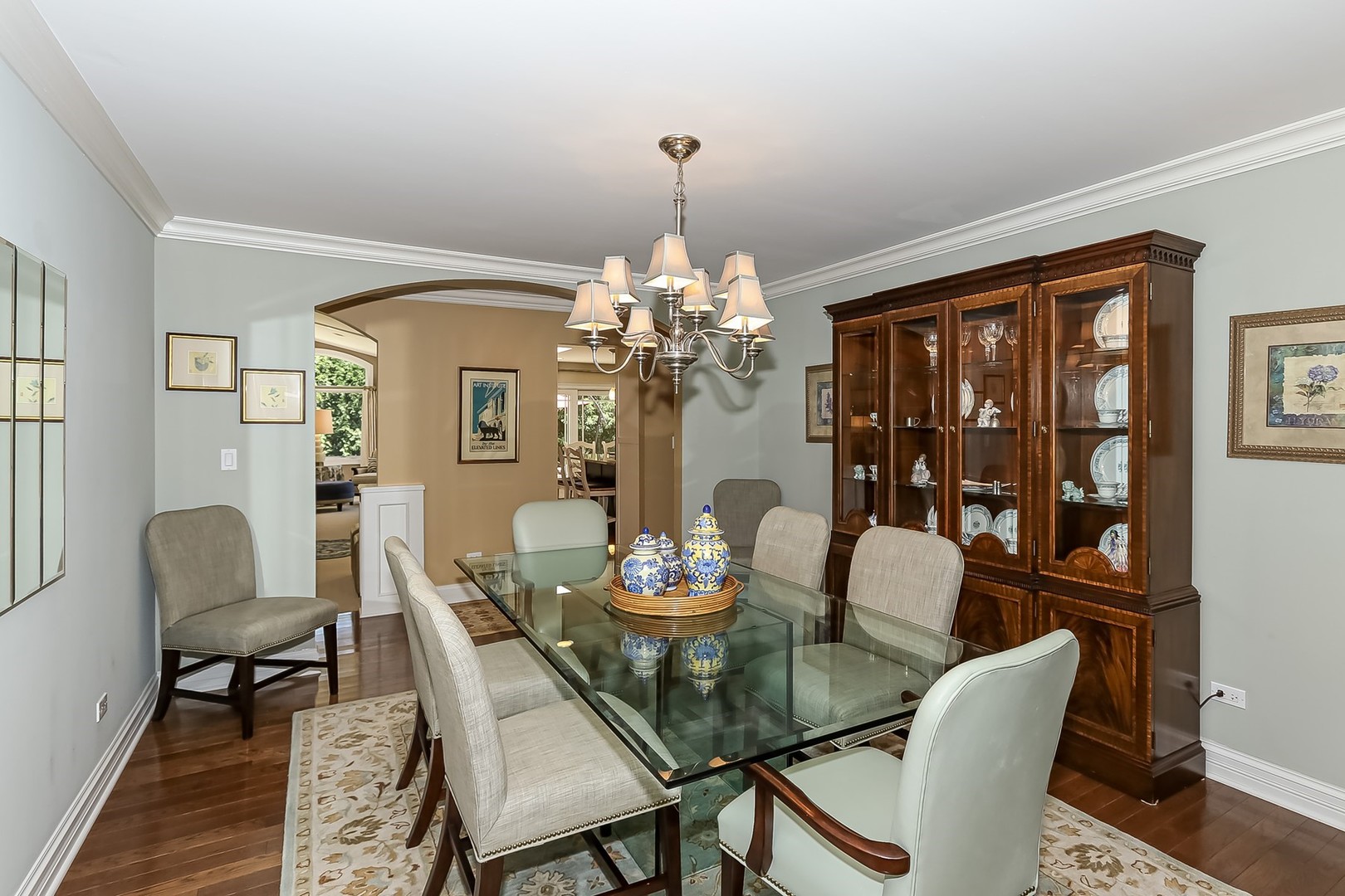 1117 Old Colony Road Lake Forest, IL 60045 - Photo 14 of 45 a dining room with furniture a chandelier and wooden floor