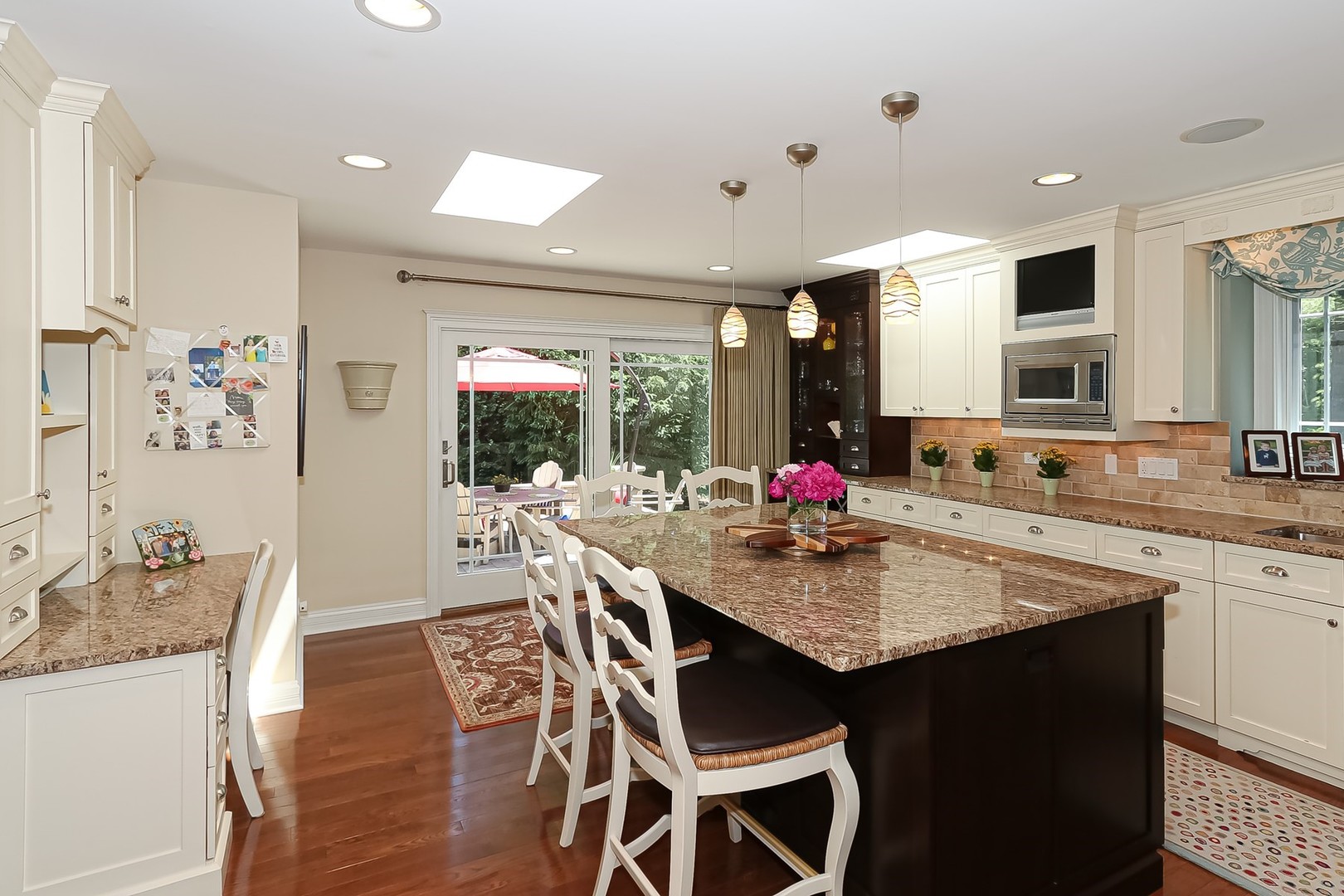 1117 Old Colony Road Lake Forest, IL 60045 - Photo 19 of 45 a view of a dining table kitchen and living room