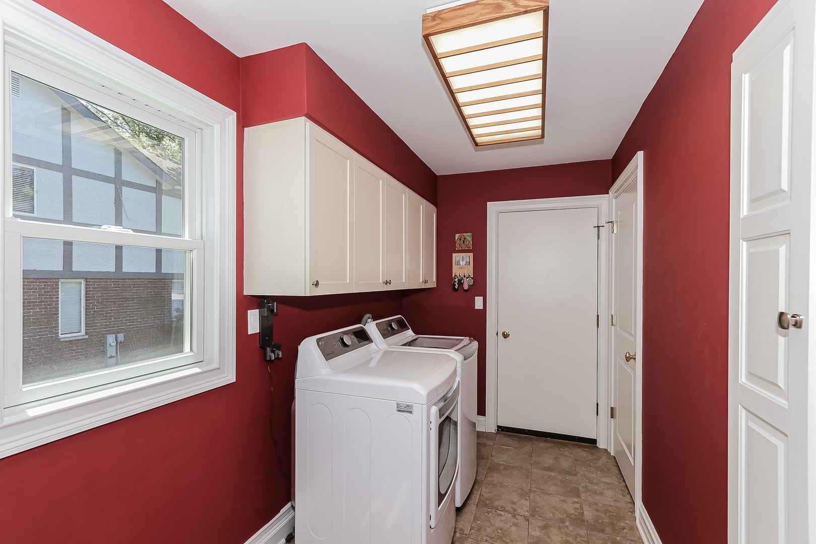 1117 Old Colony Road Lake Forest, IL 60045 - Photo 30 of 45 a utility room with dryer and washer
