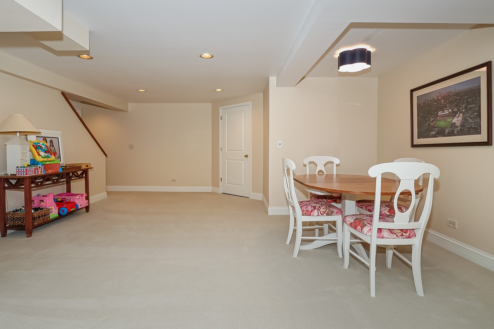 1117 Old Colony Road Lake Forest, IL 60045 - Photo 34 of 45 a dining room with furniture and a flat screen tv