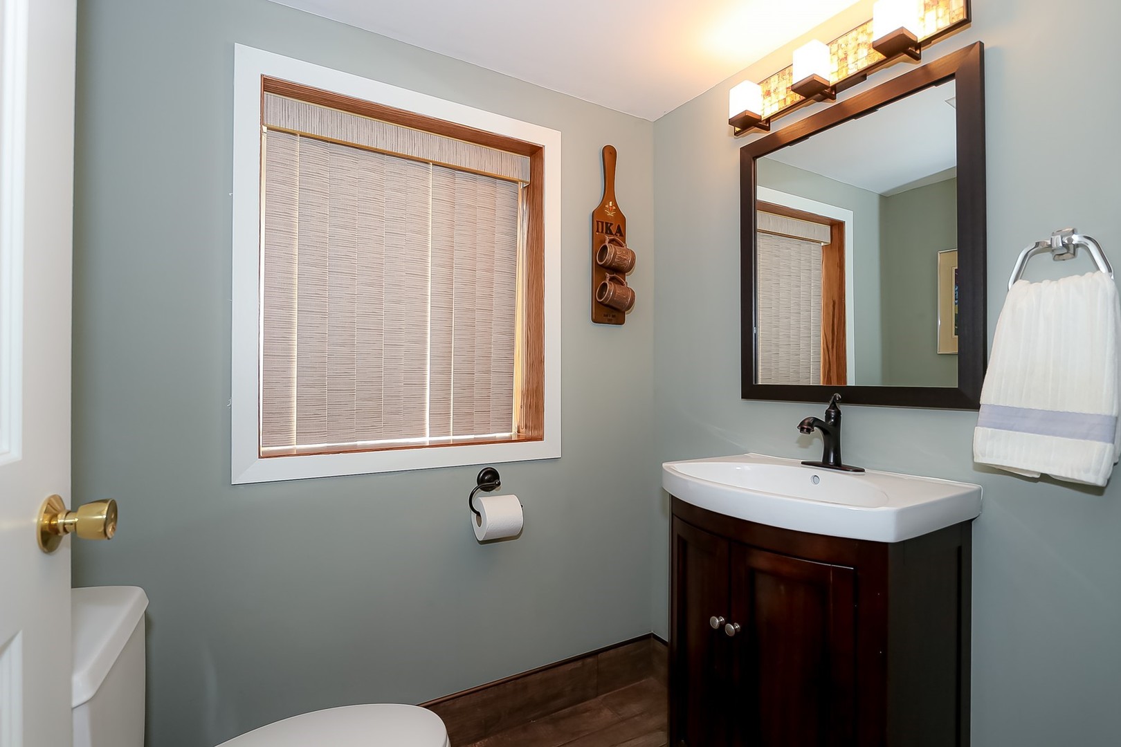 1117 Old Colony Road Lake Forest, IL 60045 - Photo 35 of 45 a bathroom with a sink and a mirror