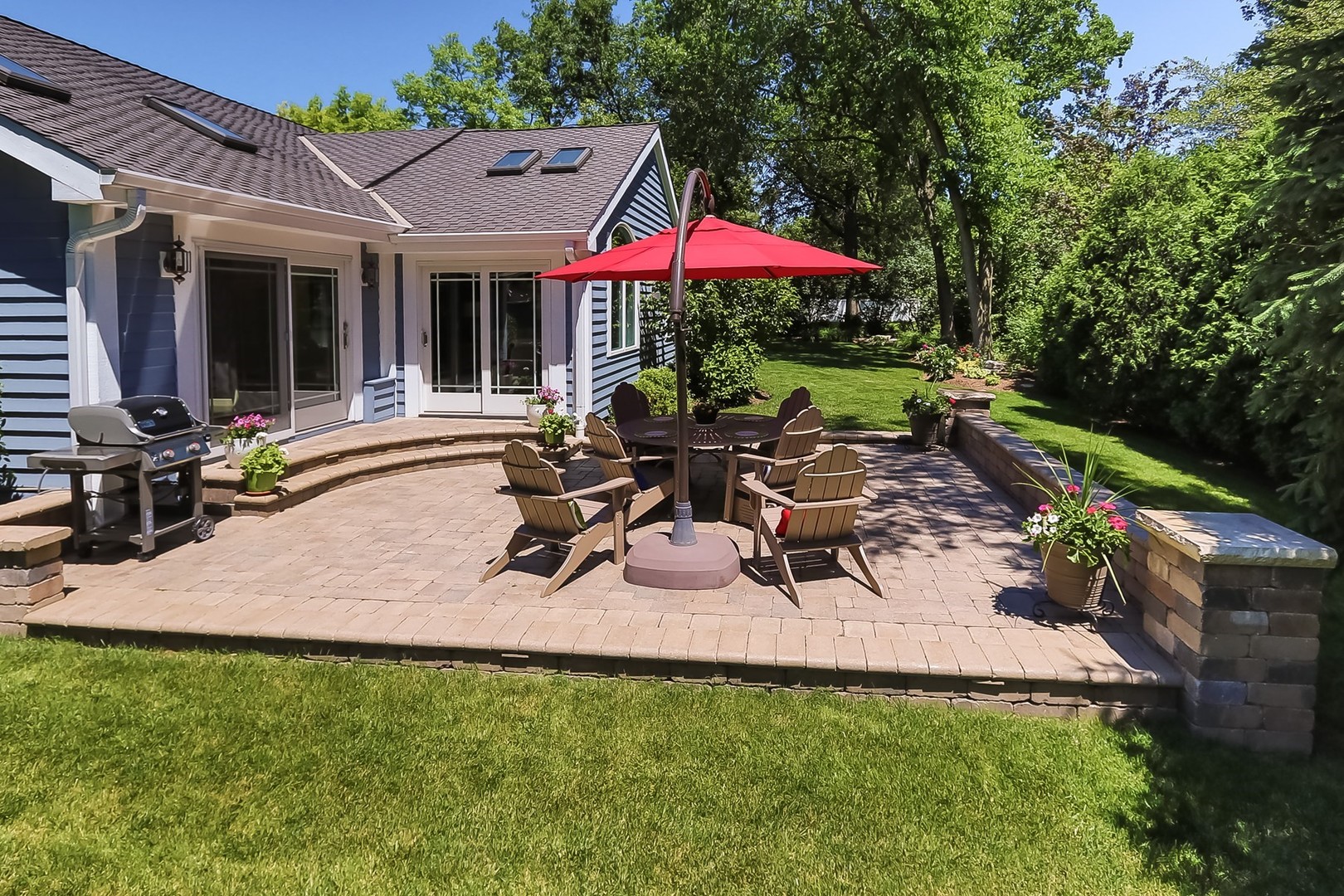1117 Old Colony Road Lake Forest, IL 60045 - Photo 38 of 45 a view of a house with backyard sitting area and garden