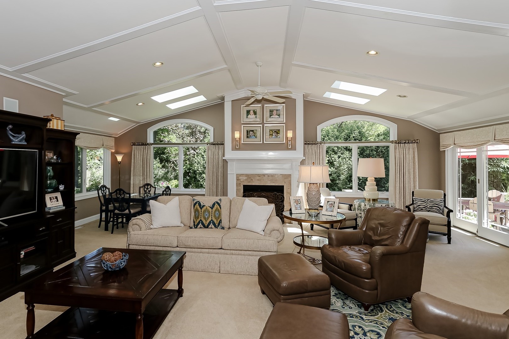 1117 Old Colony Road Lake Forest, IL 60045 - Photo 7 of 45 a living room with furniture a large window and a fireplace