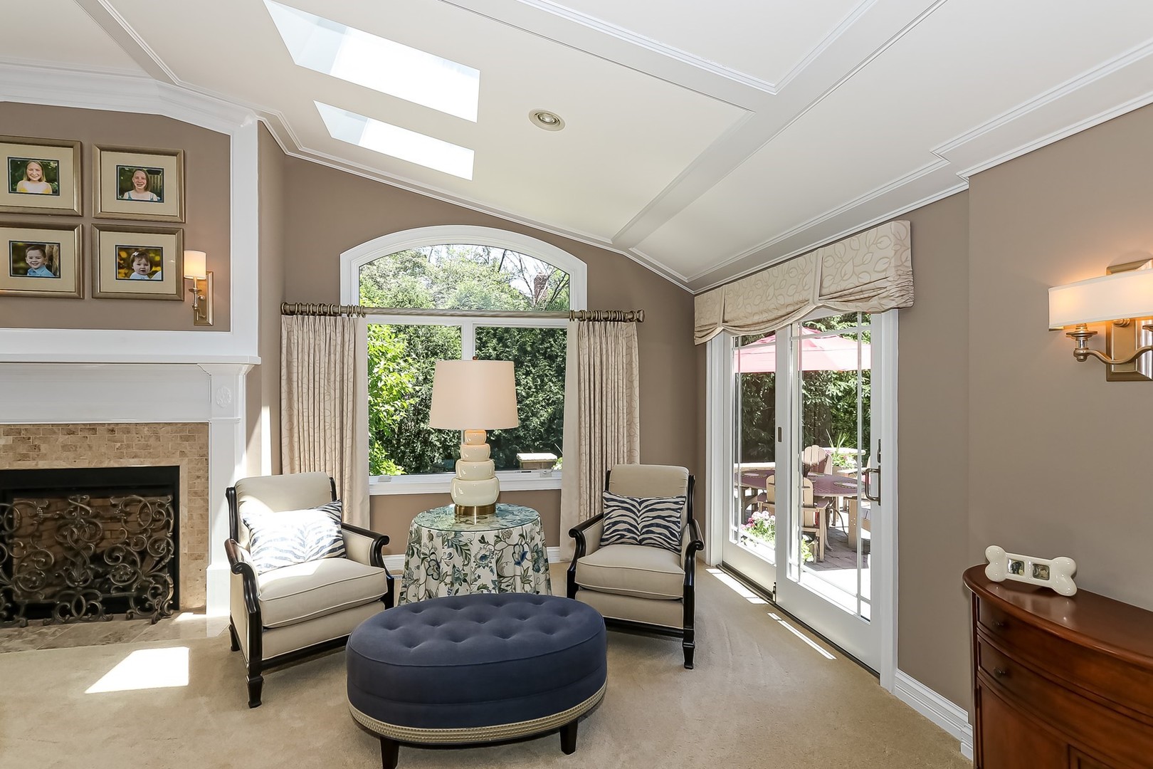 1117 Old Colony Road Lake Forest, IL 60045 - Photo 8 of 45 a living room with furniture a fireplace and a large window