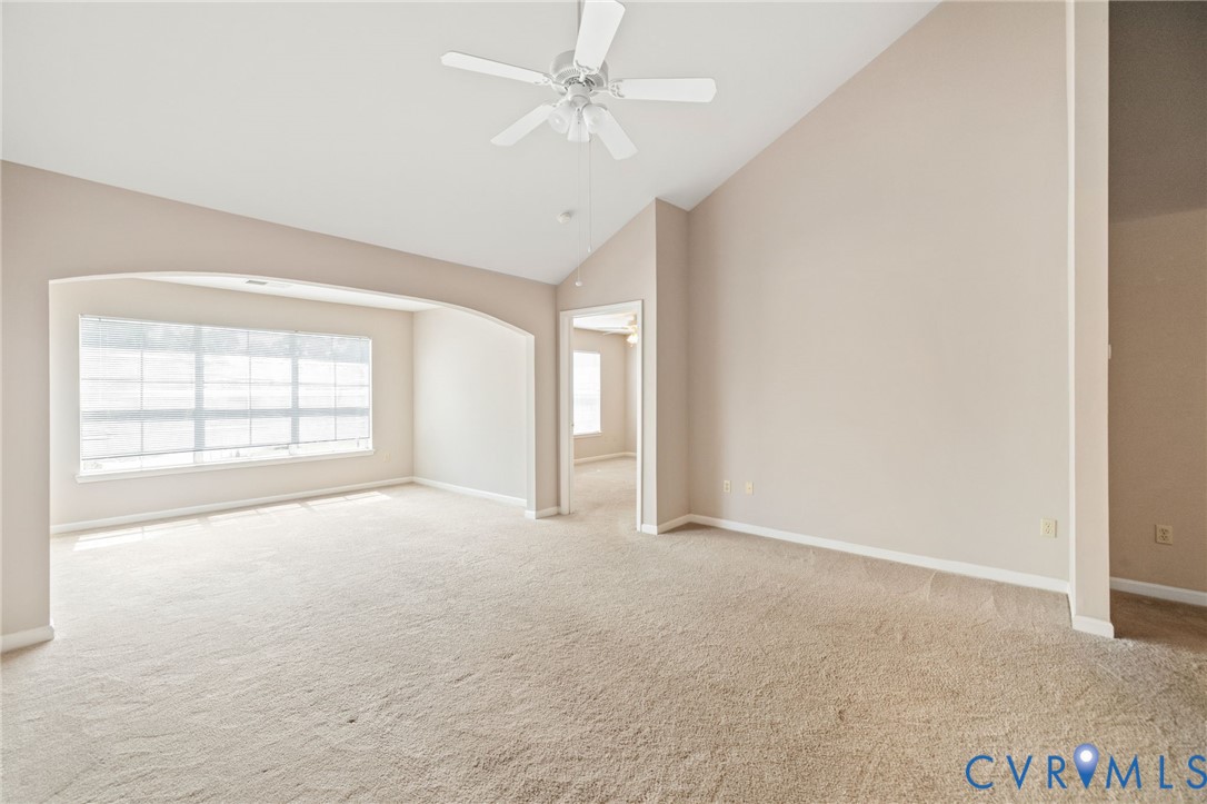 600 Fern Meadow Loop, Unit 308 Midlothian, VA 23114 - Photo 15 of 39 an empty room with windows and ceiling fan