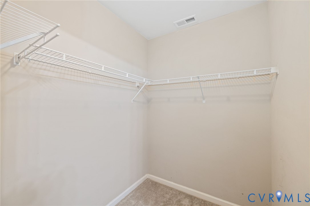 600 Fern Meadow Loop, Unit 308 Midlothian, VA 23114 - Photo 26 of 39 a view of a room with racks on the wall