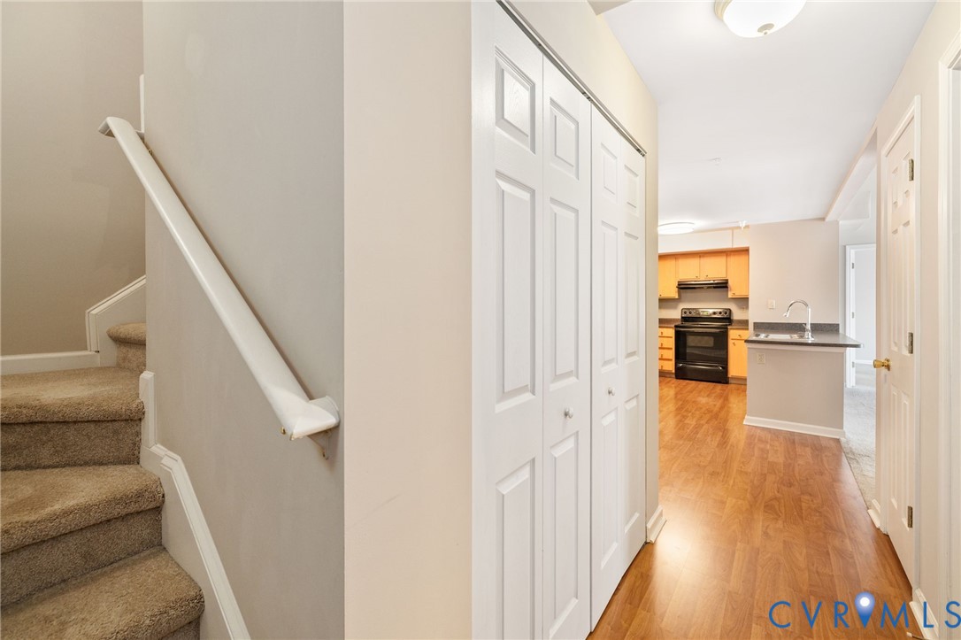 600 Fern Meadow Loop, Unit 308 Midlothian, VA 23114 - Photo 32 of 39 a view of a hallway view with wooden floor and staircase