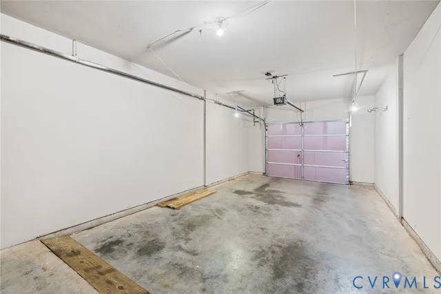 a picture of a wall with a white building