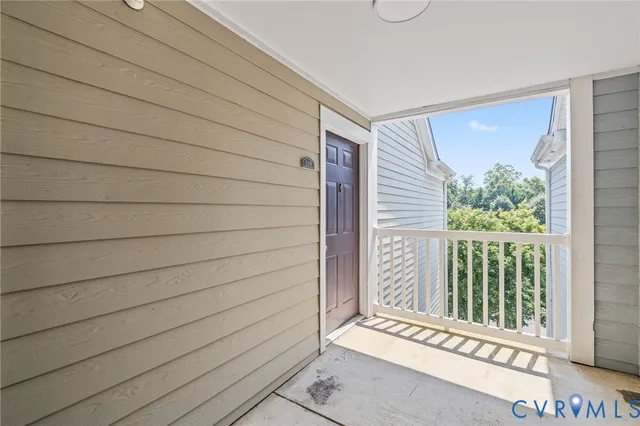 a view of a door and a window