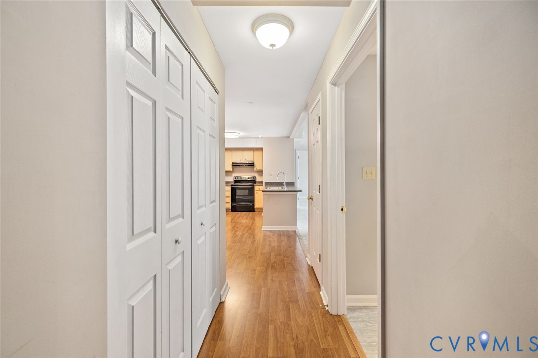 600 Fern Meadow Loop, Unit 308 Midlothian, VA 23114 - Photo 7 of 39 a view of a hallway with wooden floor and staircase