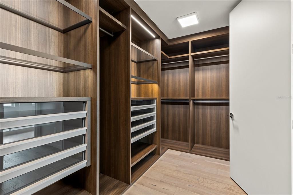 1020 Sunset Point Road, Unit 108 Clearwater, FL 33755 - Photo 18 of 62 a view of walk in closet