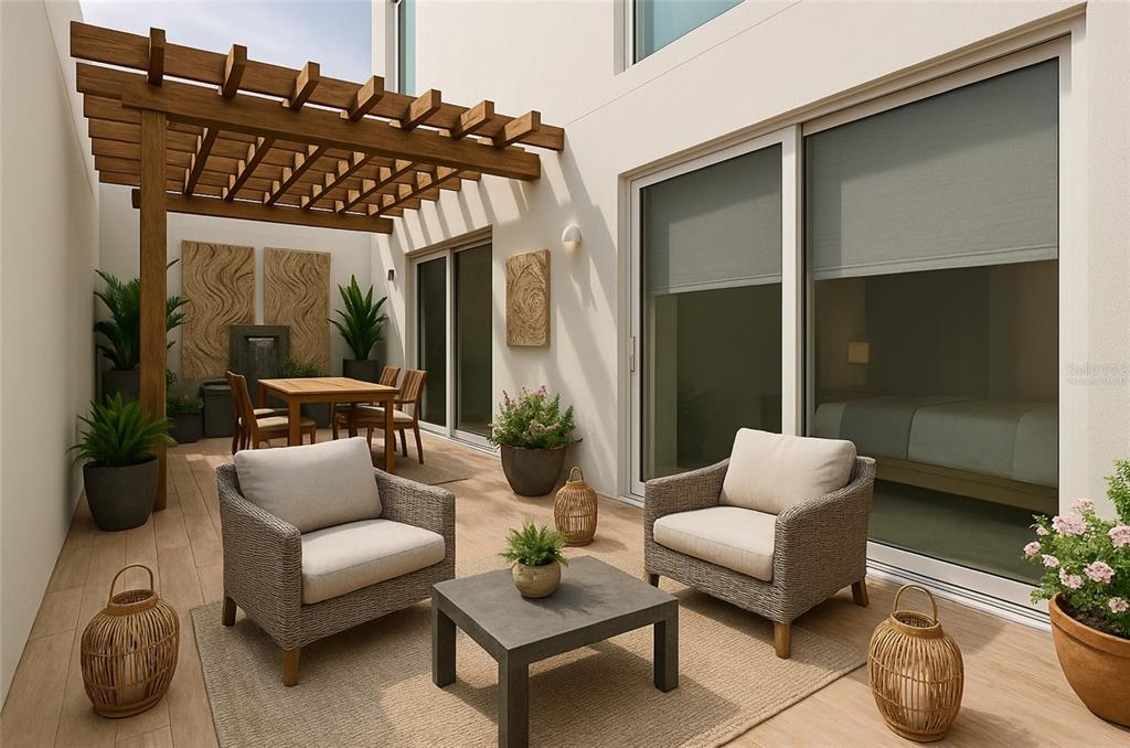 1020 Sunset Point Road, Unit 108 Clearwater, FL 33755 - Photo 29 of 62 a living room with furniture and a potted plant