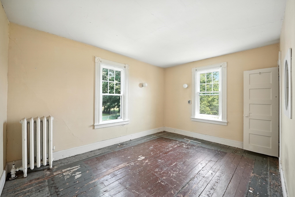 36 Maple Terrace West Springfield, MA 01089 - Photo 14 of 33 an empty room with wooden floor and windows