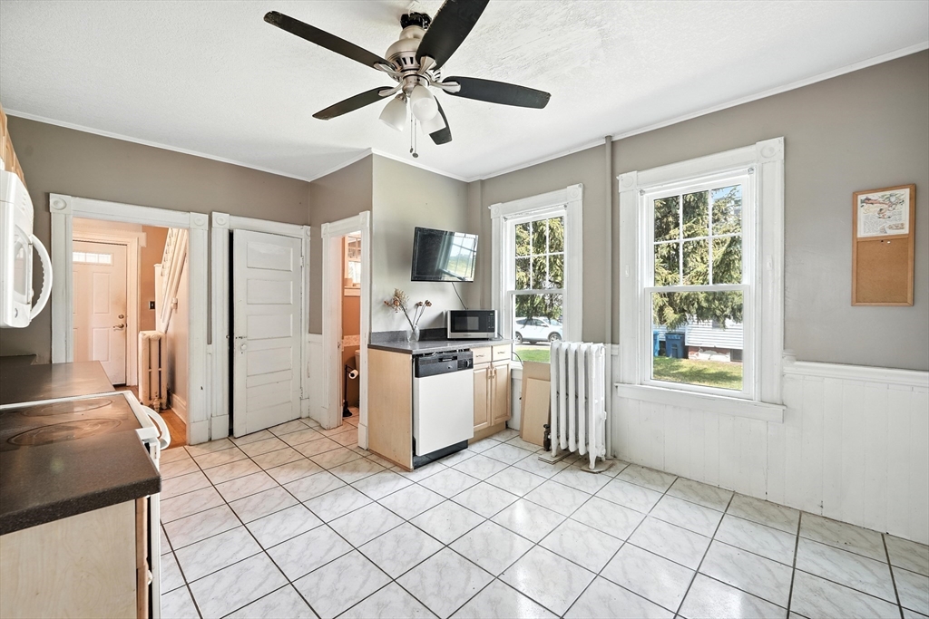 36 Maple Terrace West Springfield, MA 01089 - Photo 22 of 33 a kitchen with windows and refrigerator