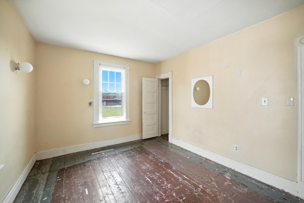 36 Maple Terrace West Springfield, MA 01089 - Photo 23 of 33 a view of a livingroom with wooden floor and window