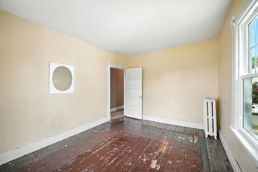 36 Maple Terrace West Springfield, MA 01089 - Photo 32 of 33 an empty room with wooden floor and windows