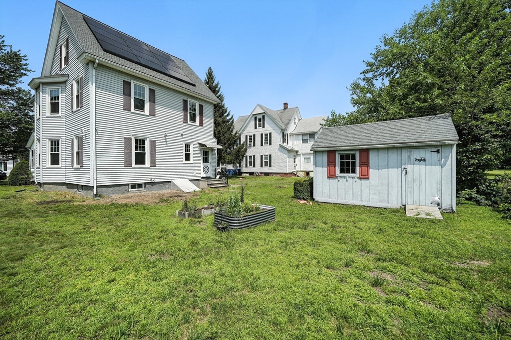 36 Maple Terrace West Springfield, MA 01089 - Photo 4 of 33 a house view with a garden space