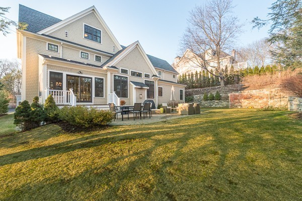 56 Westgate Road Newton, MA 02459 - Photo 26 of 28 a front view of a house with swimming pool having outdoor seating