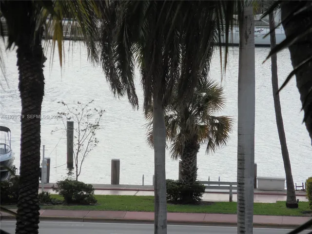 a view of a balcony with plants