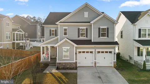 a front view of a house with a porch