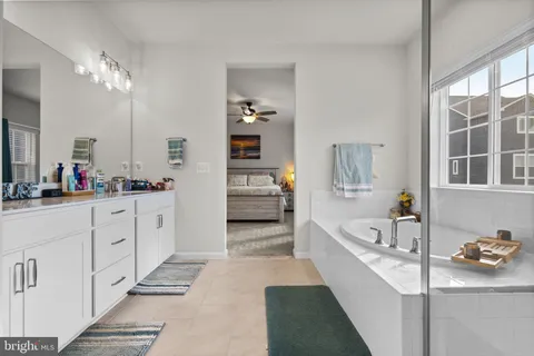 a bed room with a bed and a window