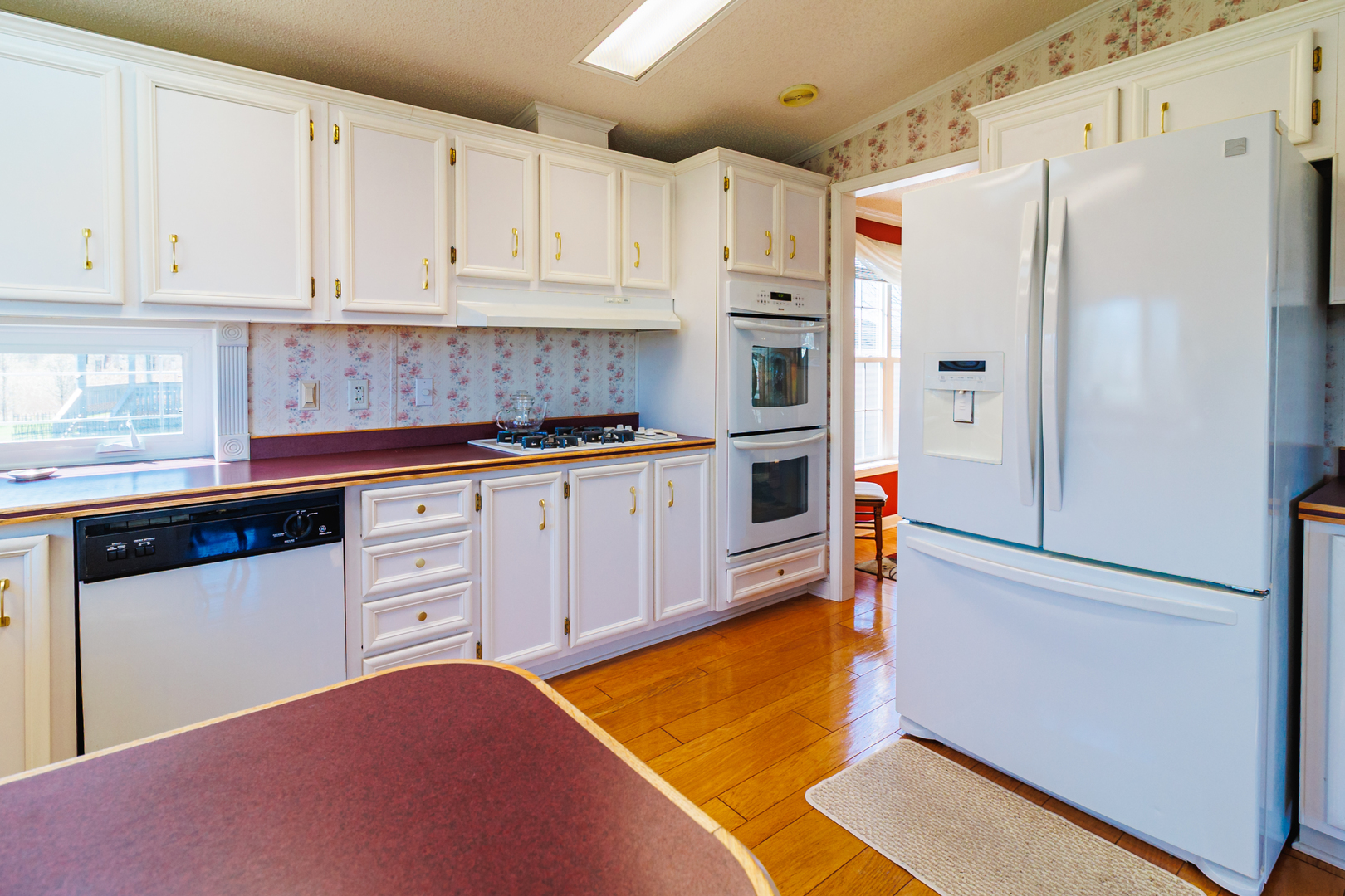 275 Tulip Circle Matteson, IL 60443 - Photo 11 of 44 a kitchen with white cabinets and refrigerator