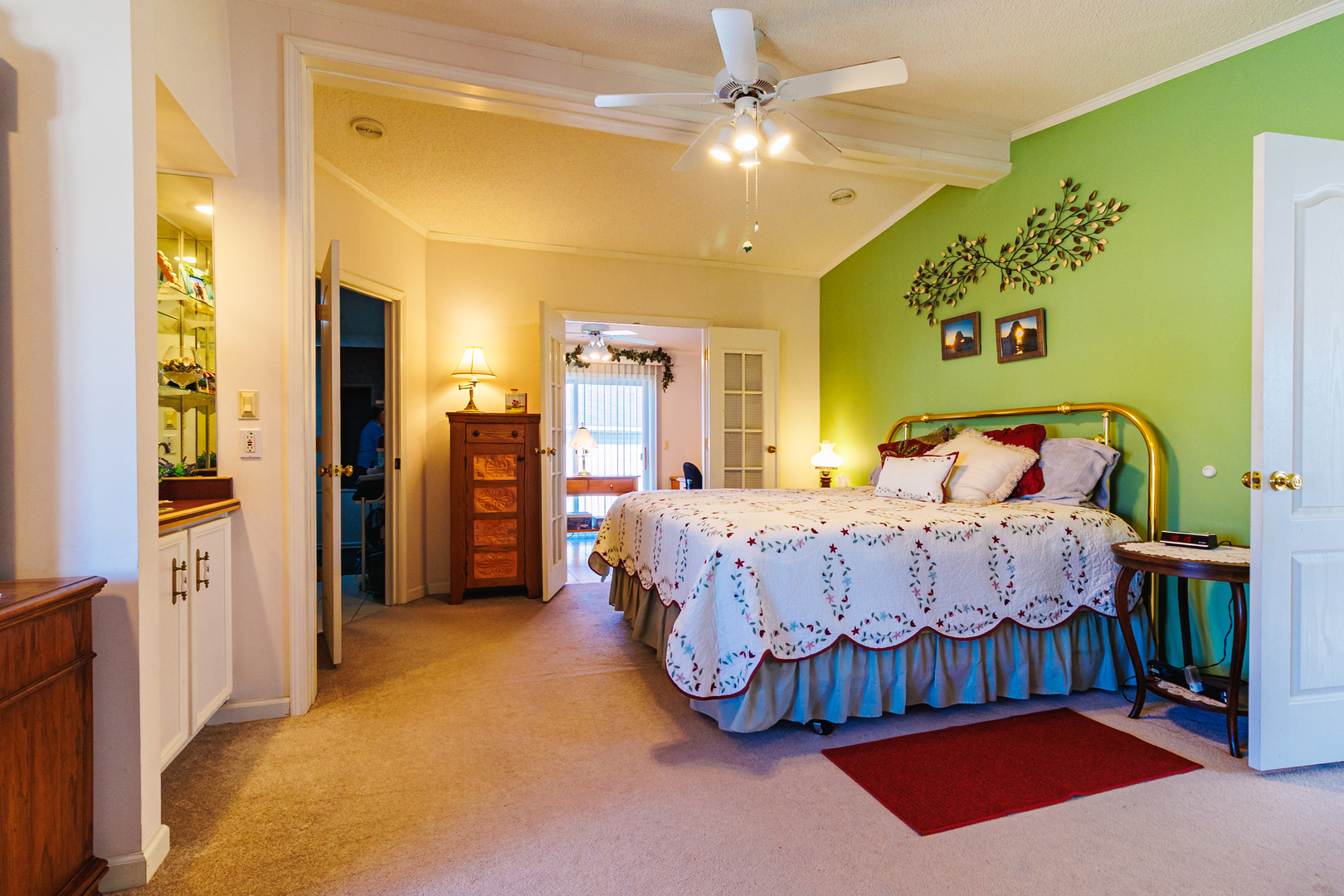 275 Tulip Circle Matteson, IL 60443 - Photo 18 of 44 a bedroom with a bed and a chandelier