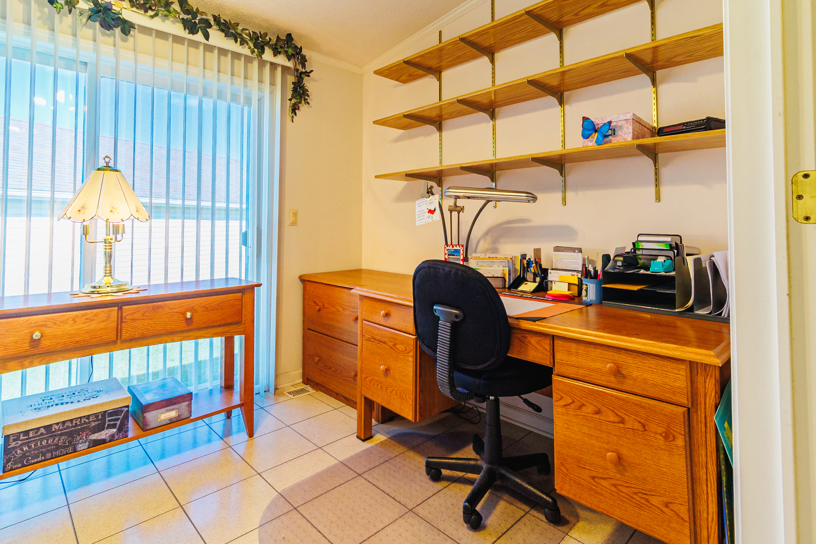 275 Tulip Circle Matteson, IL 60443 - Photo 20 of 44 a view of a workspace with furniture and a window