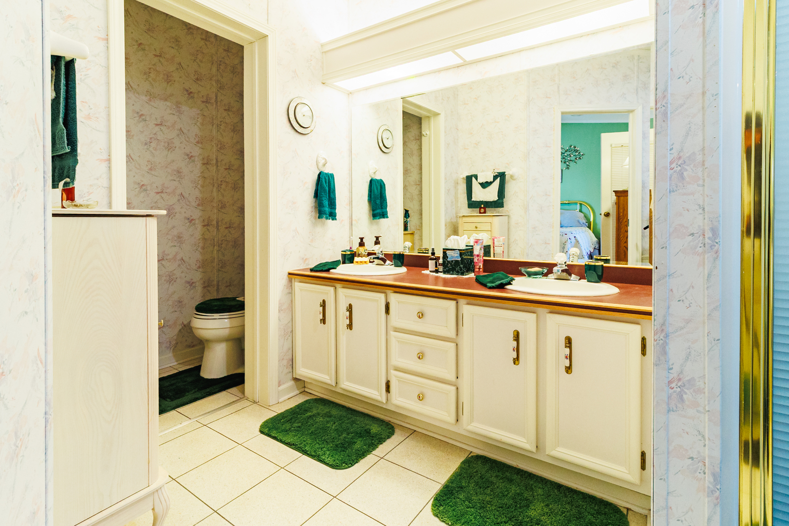 275 Tulip Circle Matteson, IL 60443 - Photo 22 of 44 a spacious bathroom with a double vanity sink toilet and a shower