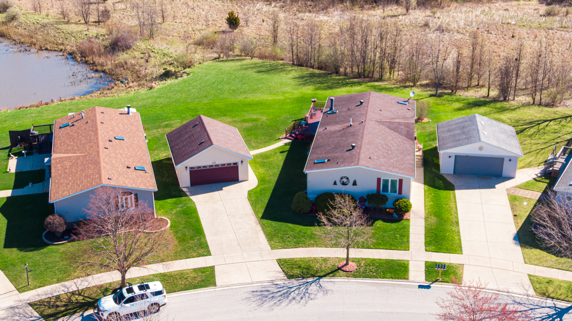 275 Tulip Circle Matteson, IL 60443 - Photo 3 of 44 an aerial view of a house with a garden and trees