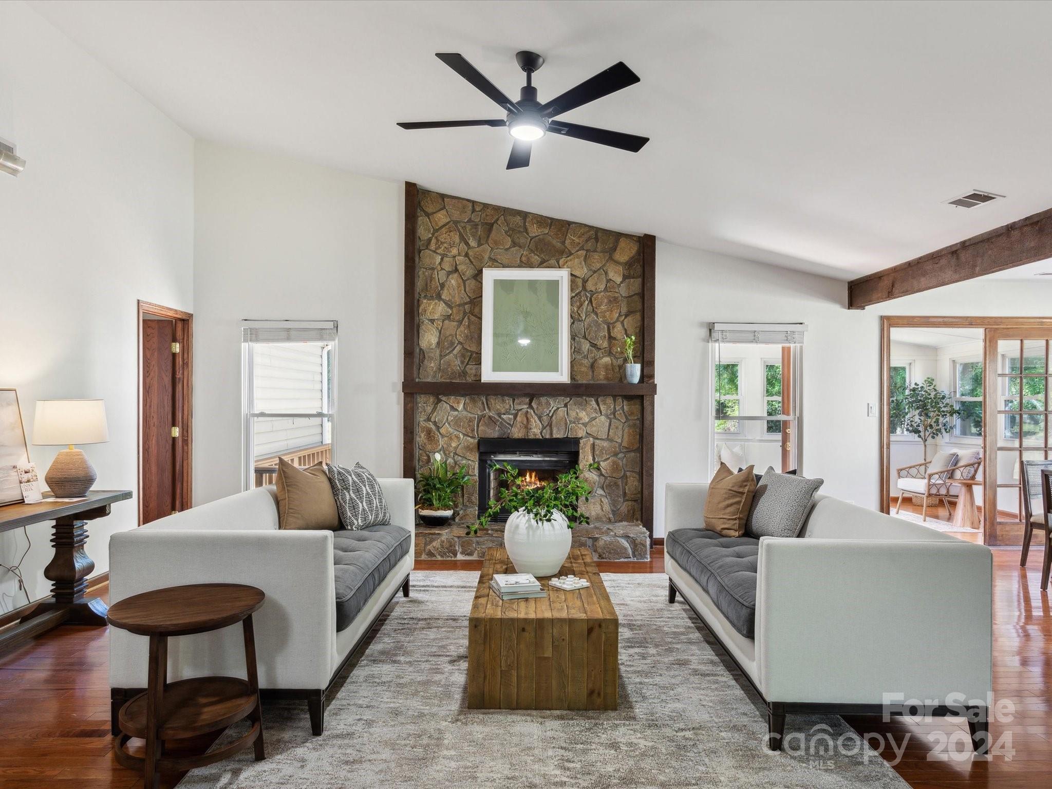 10039 Fairway Ridge Road Charlotte, NC 28277 - Photo 1 of 28 a living room with furniture and a fireplace