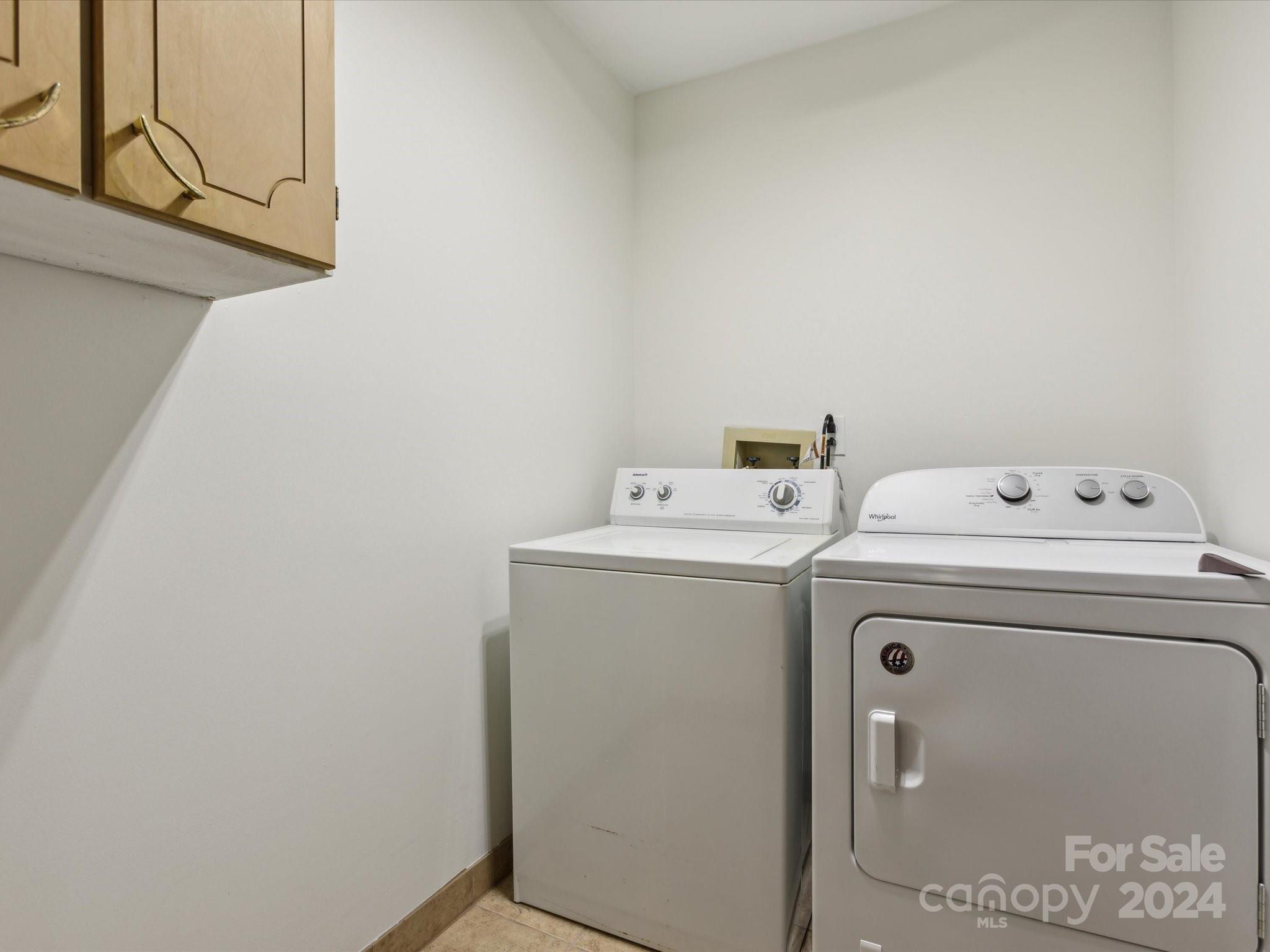 10039 Fairway Ridge Road Charlotte, NC 28277 - Photo 25 of 28 a utility room with dryer and washer