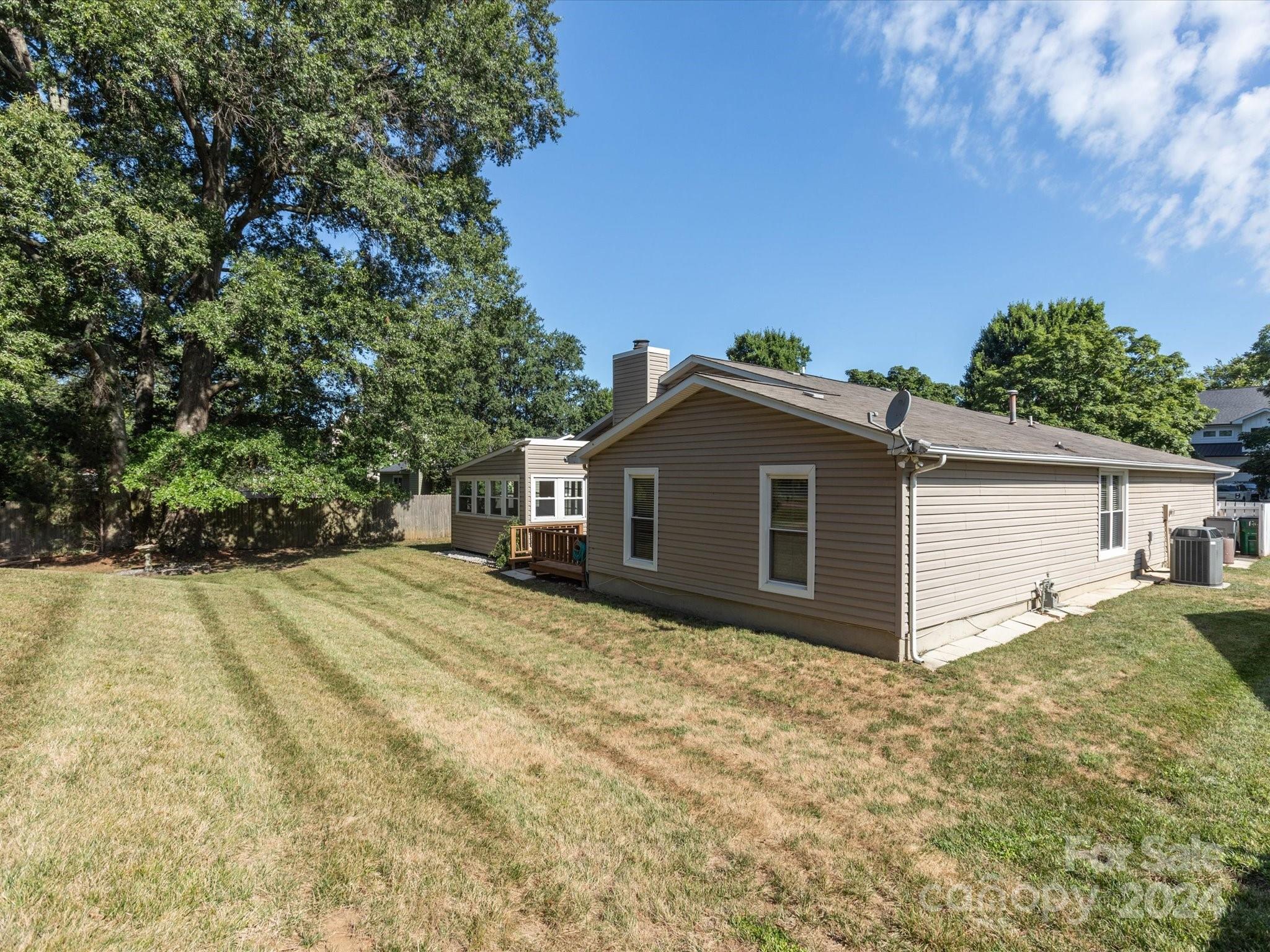 10039 Fairway Ridge Road Charlotte, NC 28277 - Photo 28 of 28 a view of a house with a yard