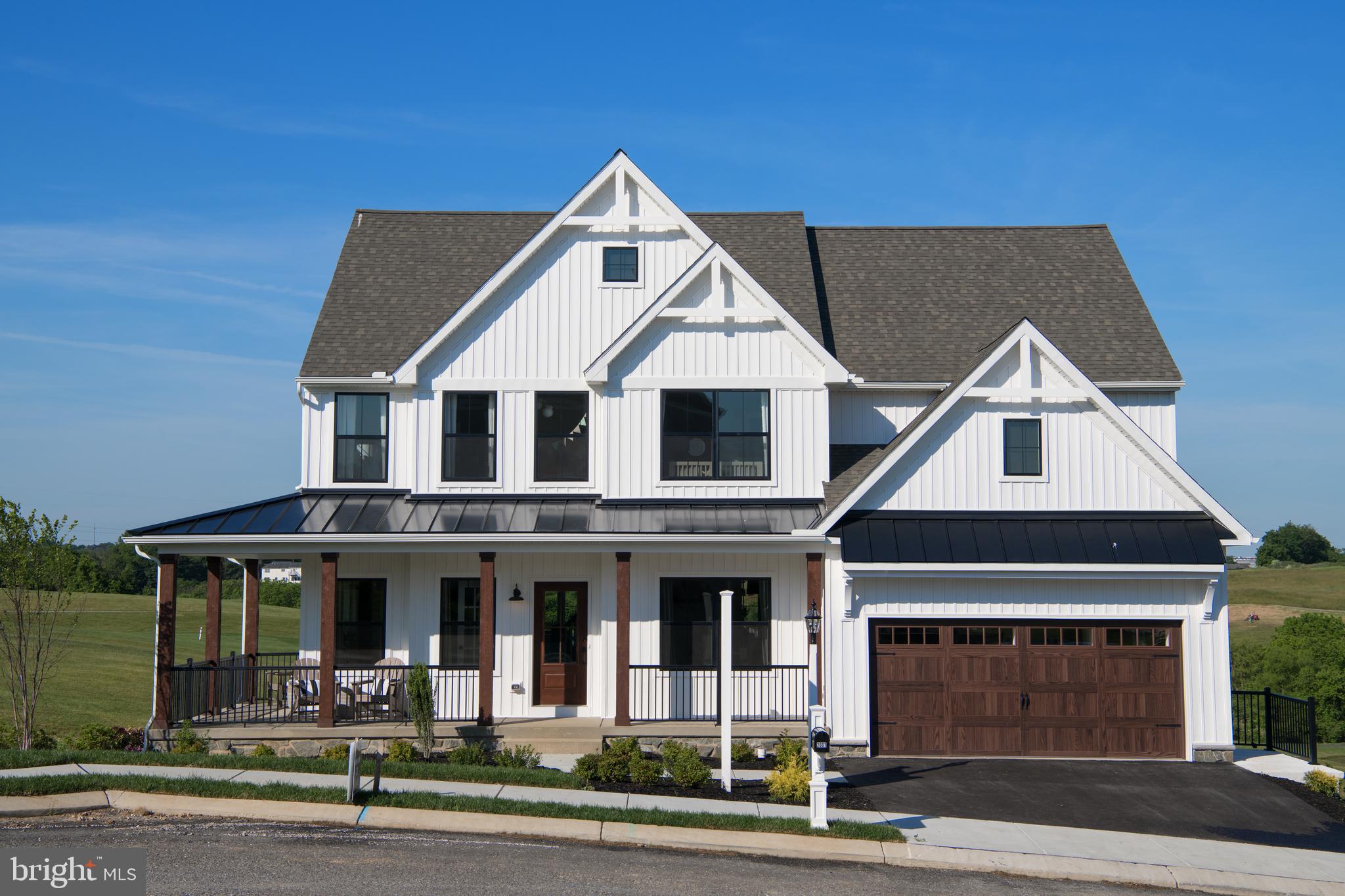 Lot#1 Jefferson Pike, Unit PARKER Jefferson, MD 21755 - Photo 1 of 15 a front view of a house with a yard