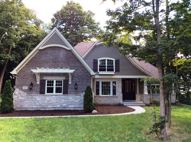 17 P Ashe Road Sugar Grove, IL 60554 - Photo 1 of 17 a front view of a house with a yard