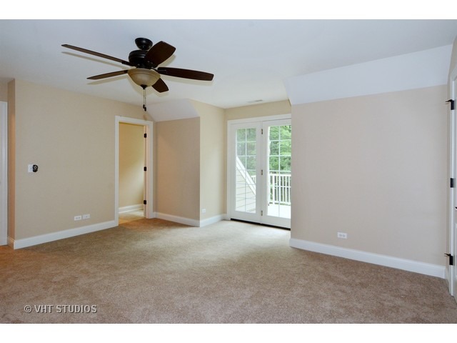 17 P Ashe Road Sugar Grove, IL 60554 - Photo 12 of 17 a view of a livingroom with a ceiling fan and window