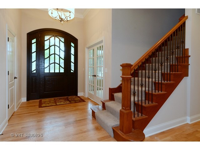 17 P Ashe Road Sugar Grove, IL 60554 - Photo 2 of 17 a view of an entryway with wooden floor